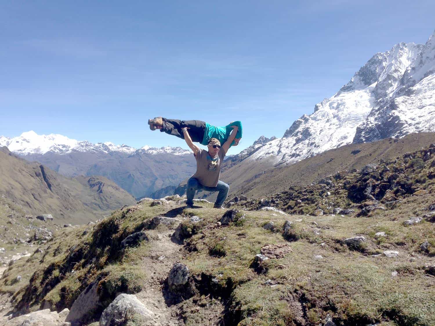 Hiker doing squats as leg-strength training for the Salkantay Trek